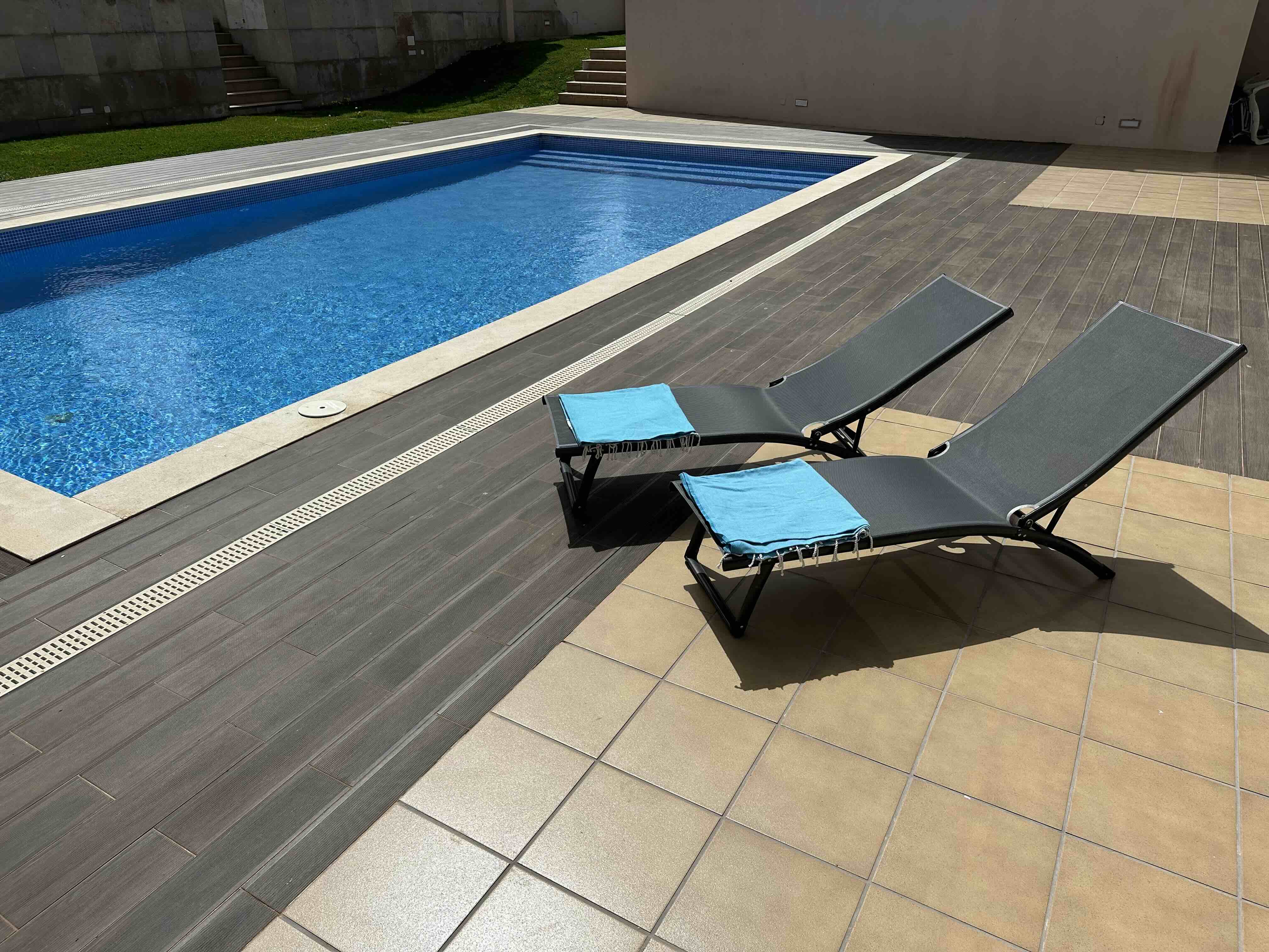 Loungers beside the pool at Casa Solaris