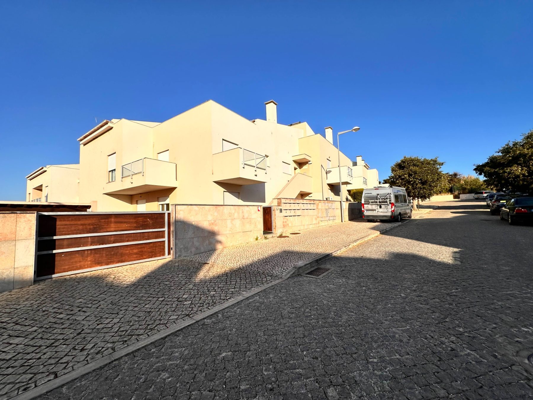 Gated street-level parking entrance at Casa Solaris